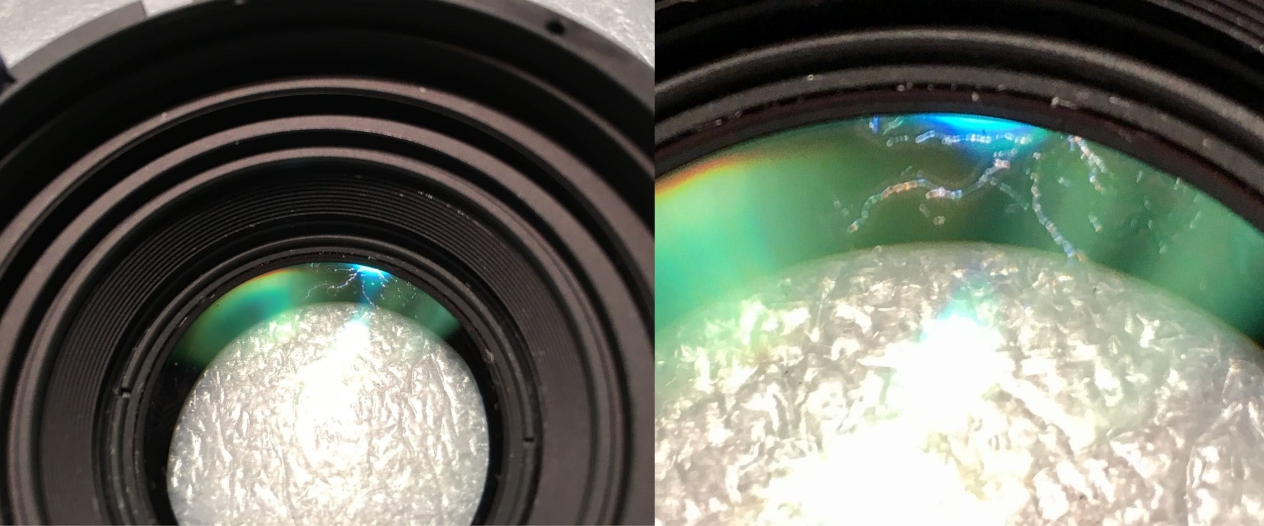 Example of lens fungus and internal optical contamination visible inside a camera lens.